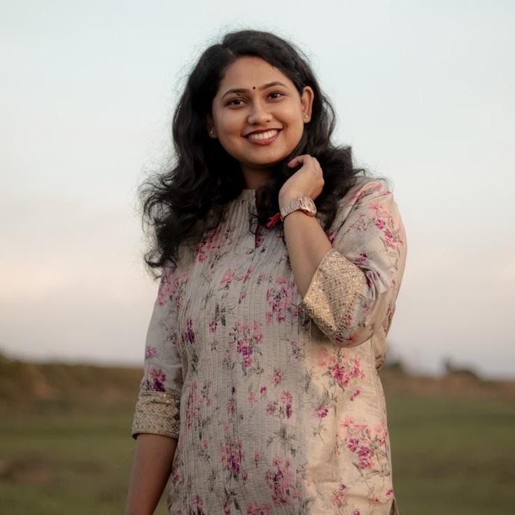 JORDAN CHEN, Client Relations Director, discussing corporate gifting strategy with business clients